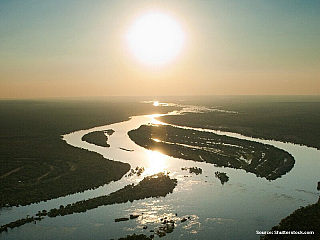 Západ slunce nad řekou (Kongo)